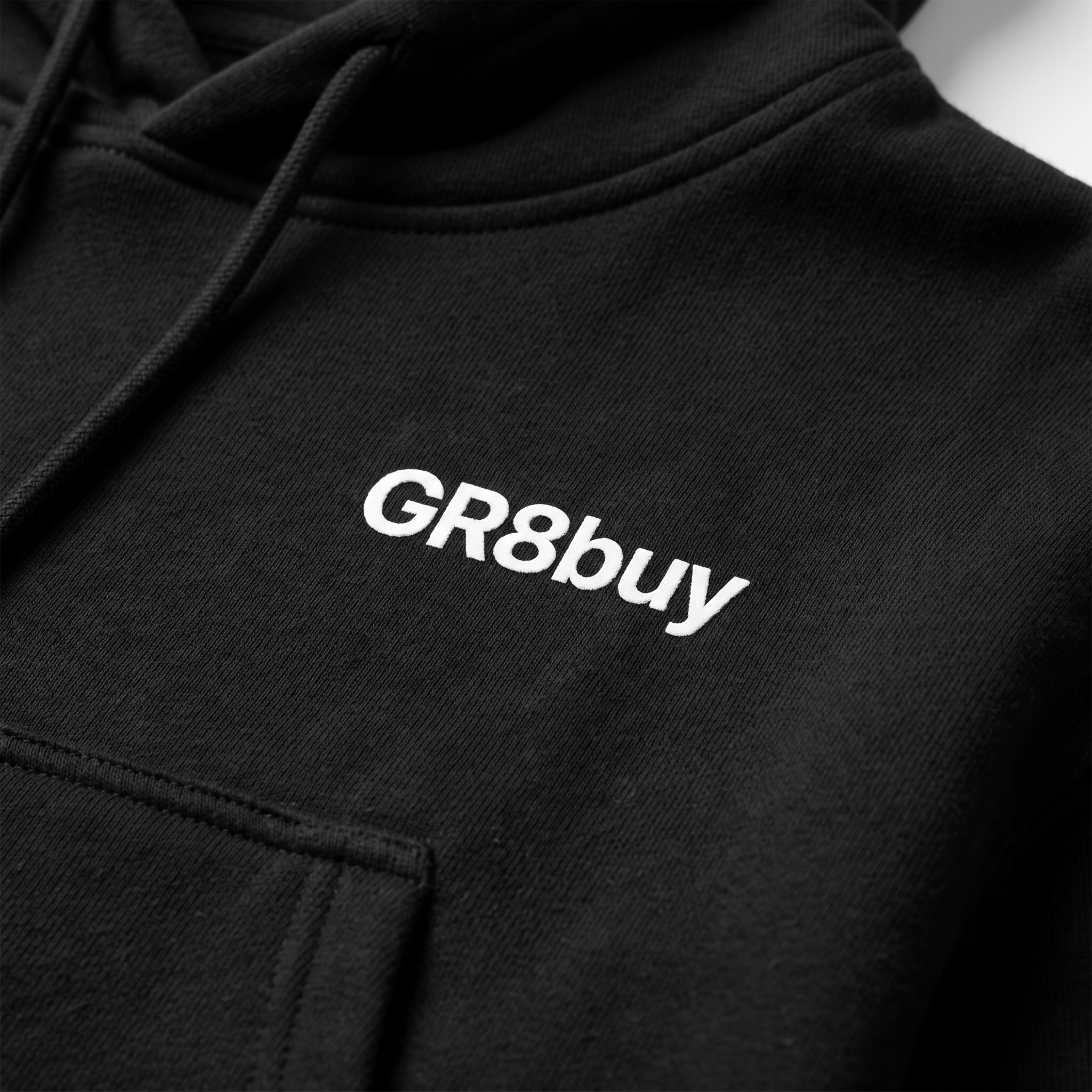 Momentum Heavyweight Hoodie, close-up detail of chest logo and fleece fabric