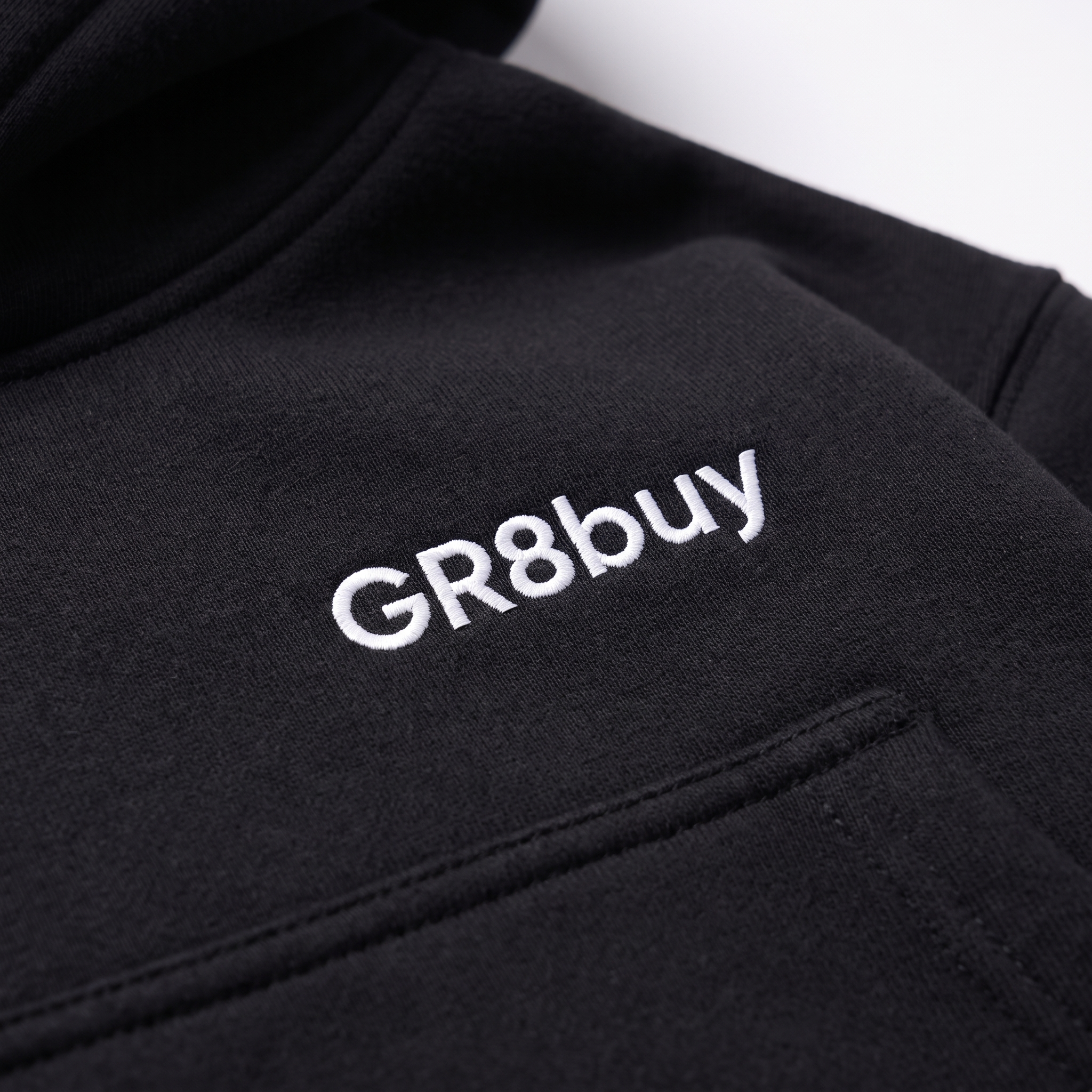 Momentum Hoodie + Jogger Set, close-up detail of chest logo